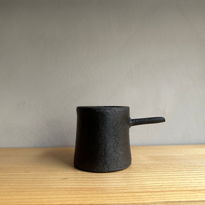 Cup with small horn