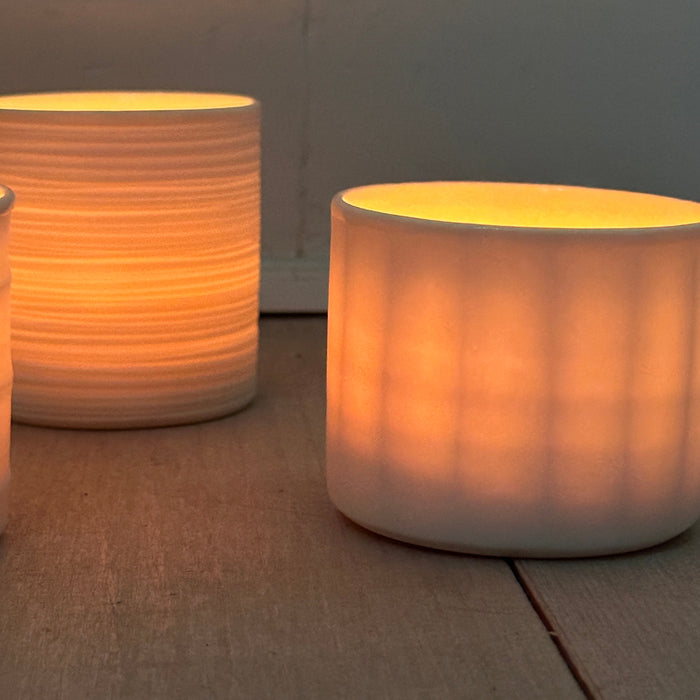 Candle lantern in porcelain, facet
