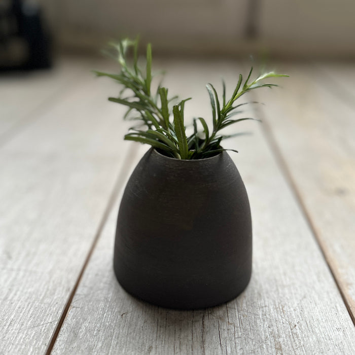 Small dark vase