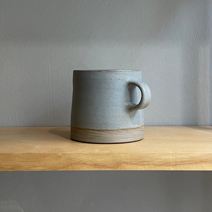 A large cup with handle, blue-gray
