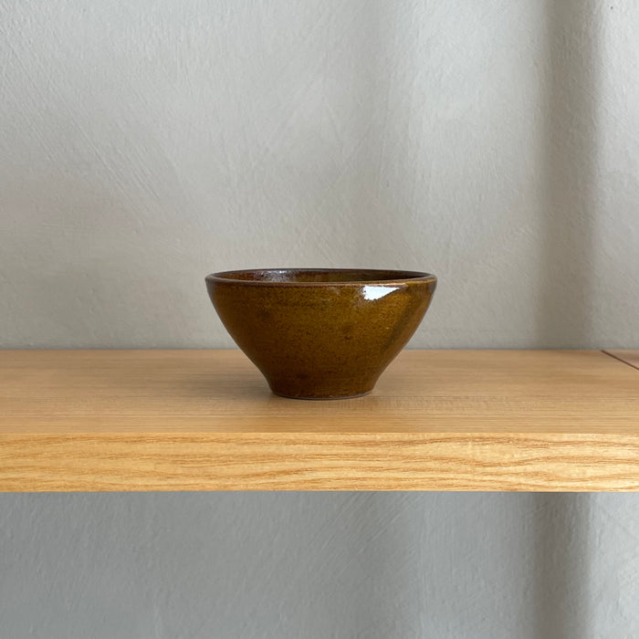Small dark rust brown bowl