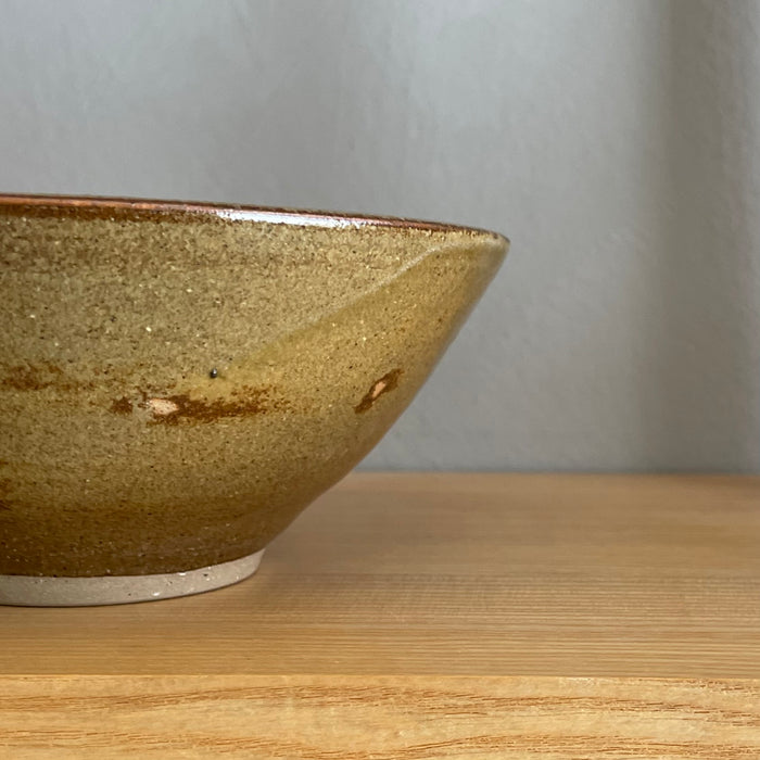Small dark rust brown bowl