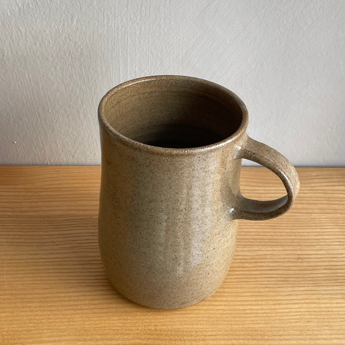 A large cup with handle, blue-gray